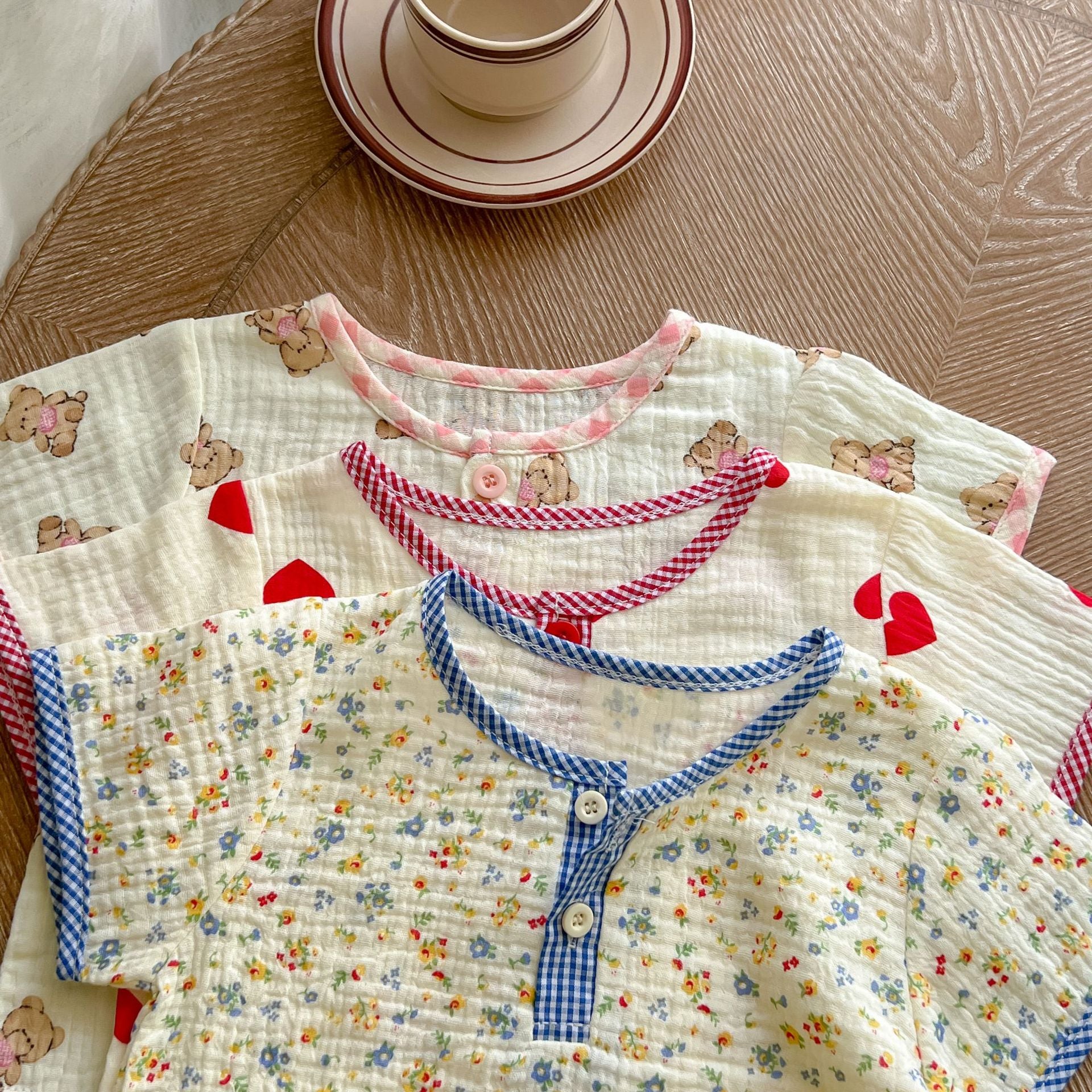 A colorful baby summer outfit featuring a print pattern t-shirt and combo shorts, perfect for keeping little ones cool and stylish.