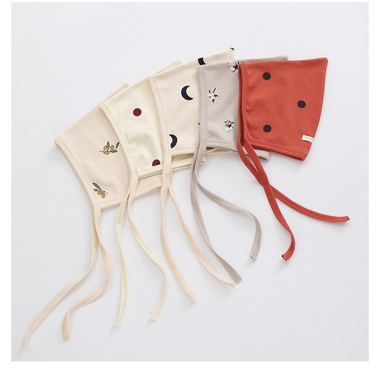 Baby Printed Graphic Side Button Design Long Sleeved Jumpsuit Romper in vibrant colors with fun graphics and a matching hat.