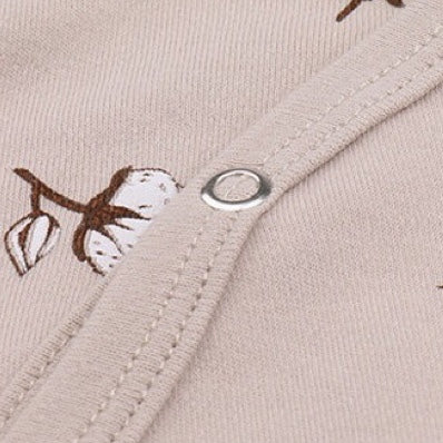 Baby Printed Graphic Side Button Design Long Sleeved Jumpsuit Romper in vibrant colors with fun graphics and a matching hat.