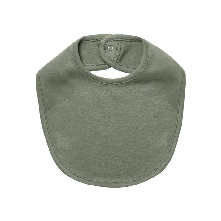 Cute baby bibs made of pure cotton with printed patterns and covered buttons, available in various colors.