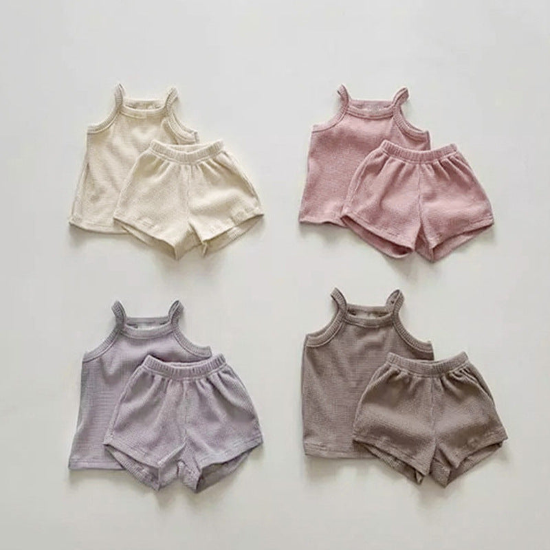 Baby Quality Waffle Knitted Fabric Sling Shirt Combo Shorts Sets in pink and apricot colors, made from soft cotton for summer wear.