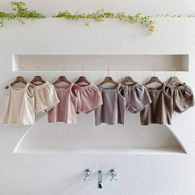 Baby Quality Waffle Knitted Fabric Sling Shirt Combo Shorts Sets in pink and apricot colors, made from soft cotton for summer wear.