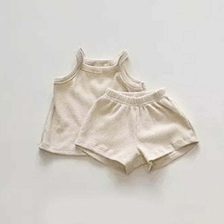 Baby Quality Waffle Knitted Fabric Sling Shirt Combo Shorts Sets in pink and apricot colors, made from soft cotton for summer wear.