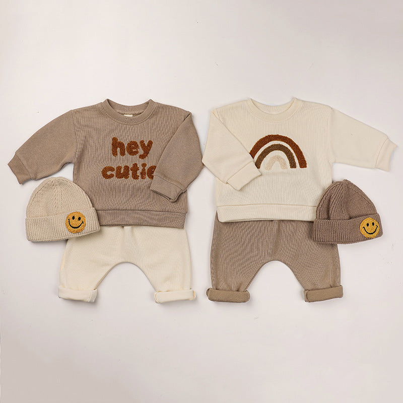 A cozy Baby Rainbow & Letter Graphic Hoodie and Pants Set in beige, featuring colorful rainbow and letter designs, perfect for babies.