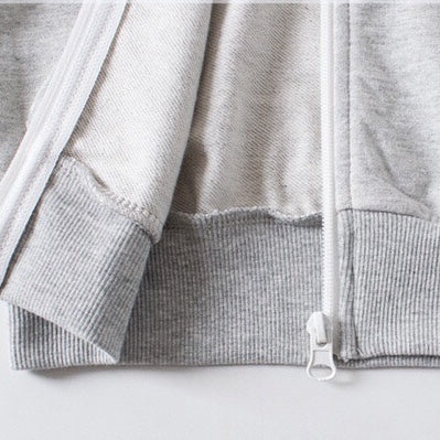 A cozy baby coat featuring a side striped pattern and zipper front design, perfect for winter wear, available in multiple colors.