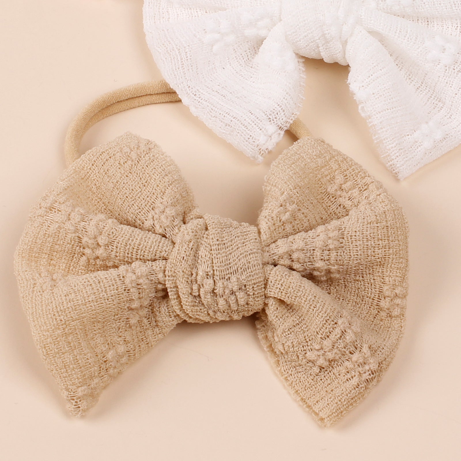 Baby Simple Style Bow Tie Hair Tape in various colors, showcasing its cute design and soft cotton material.