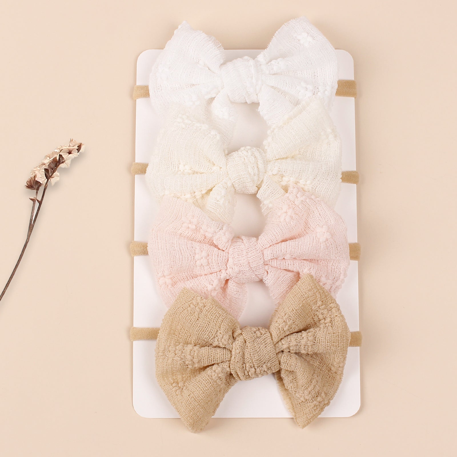 Baby Simple Style Bow Tie Hair Tape in various colors, showcasing its cute design and soft cotton material.