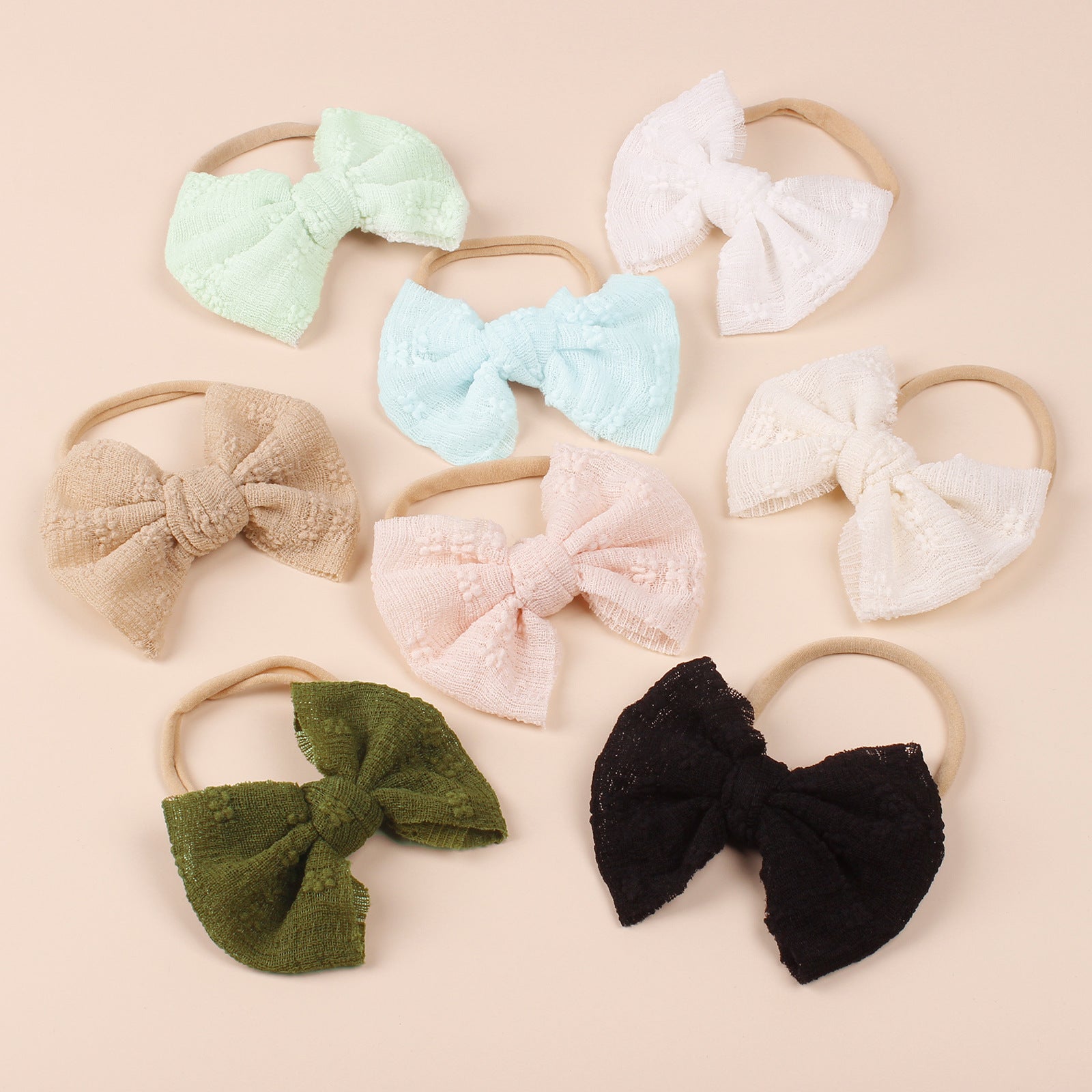 Baby Simple Style Bow Tie Hair Tape in various colors, showcasing its cute design and soft cotton material.