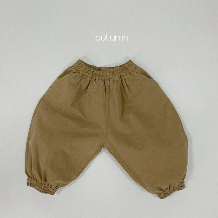 A pair of baby solid color pants in various colors, showcasing their loose and comfy design suitable for both boys and girls.