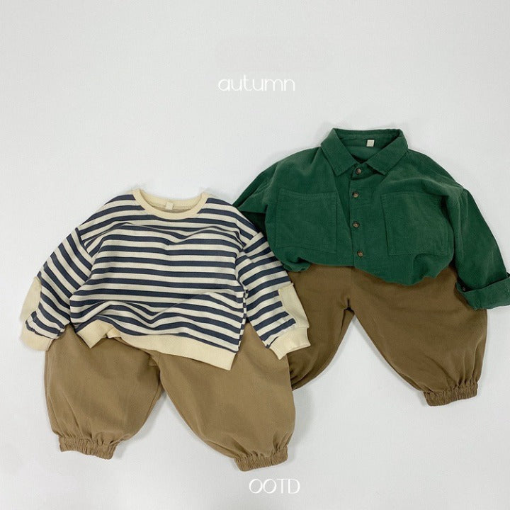 A pair of baby solid color pants in various colors, showcasing their loose and comfy design suitable for both boys and girls.