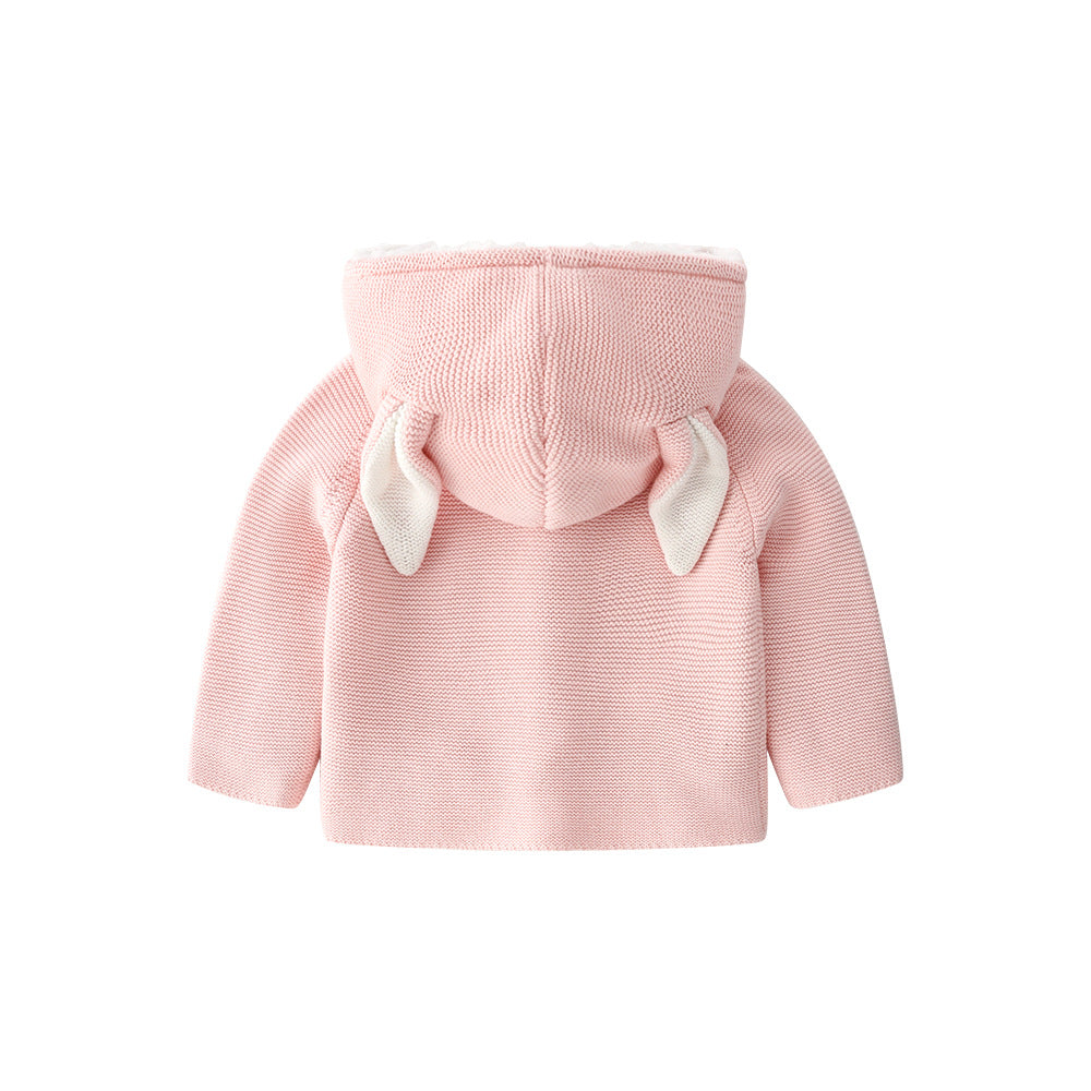 A cozy knitted cardigan for babies featuring a solid color design with bunny ears, available in pink and navy blue, perfect for chilly weather.