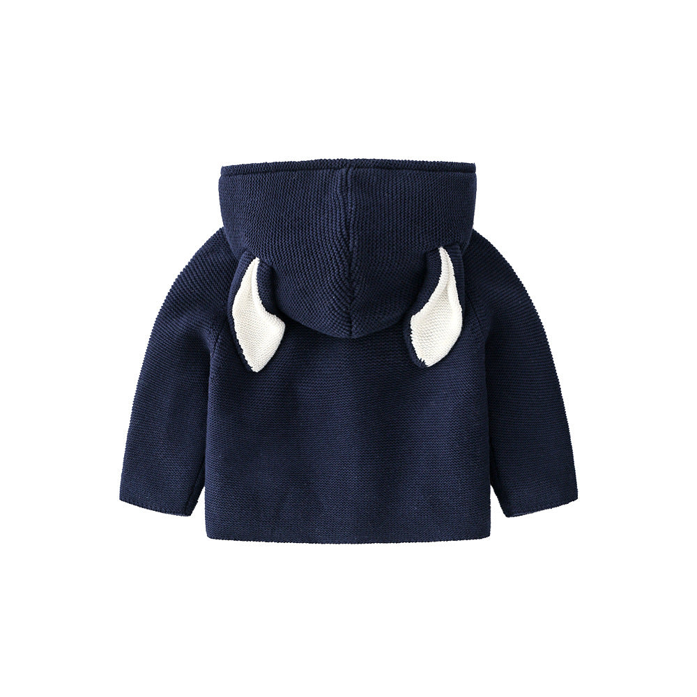 A cozy knitted cardigan for babies featuring a solid color design with bunny ears, available in pink and navy blue, perfect for chilly weather.