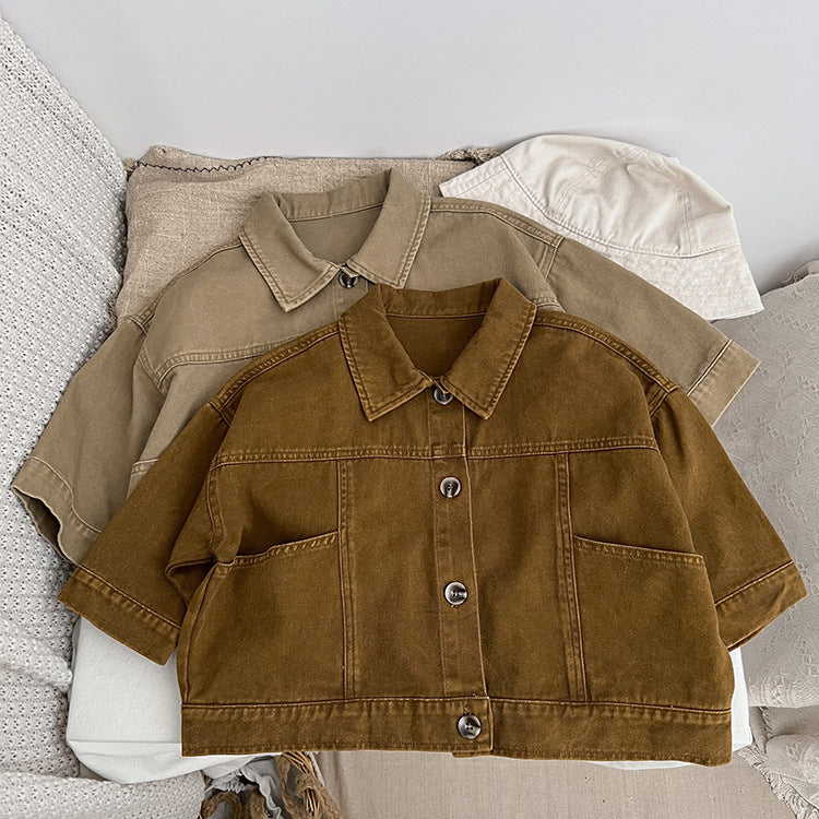 A stylish baby denim jacket in khaki and brown colors, showcasing a cool Japan style design suitable for both boys and girls.