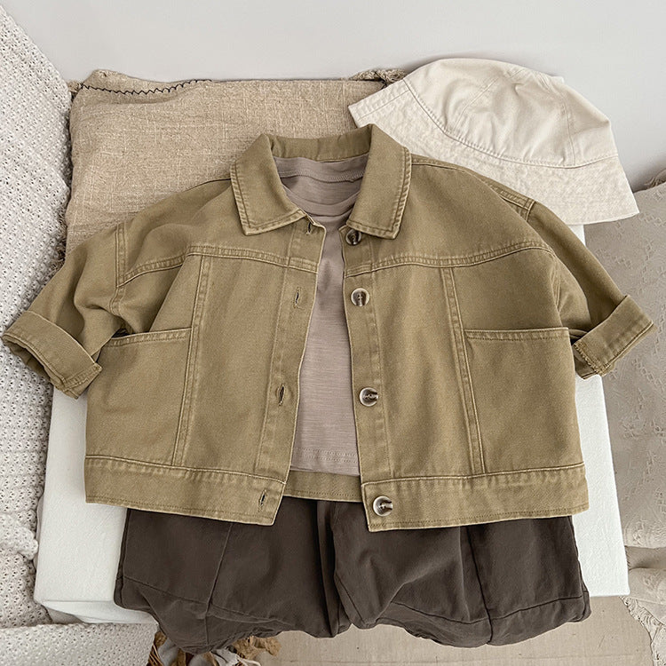 A stylish baby denim jacket in khaki and brown colors, showcasing a cool Japan style design suitable for both boys and girls.