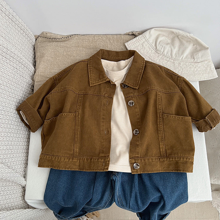 A stylish baby denim jacket in khaki and brown colors, showcasing a cool Japan style design suitable for both boys and girls.
