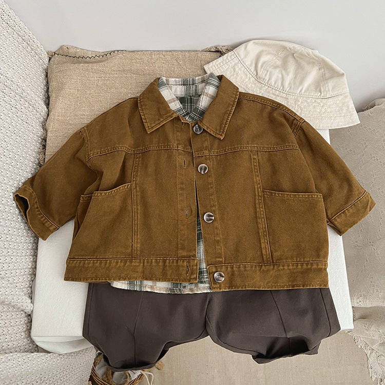 A stylish baby denim jacket in khaki and brown colors, showcasing a cool Japan style design suitable for both boys and girls.