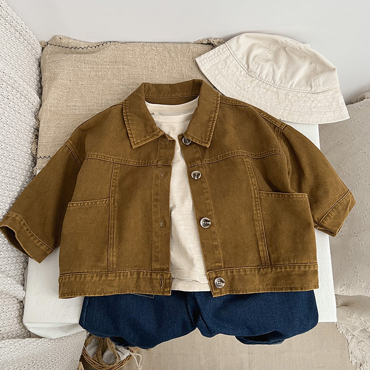 A stylish baby denim jacket in khaki and brown colors, showcasing a cool Japan style design suitable for both boys and girls.