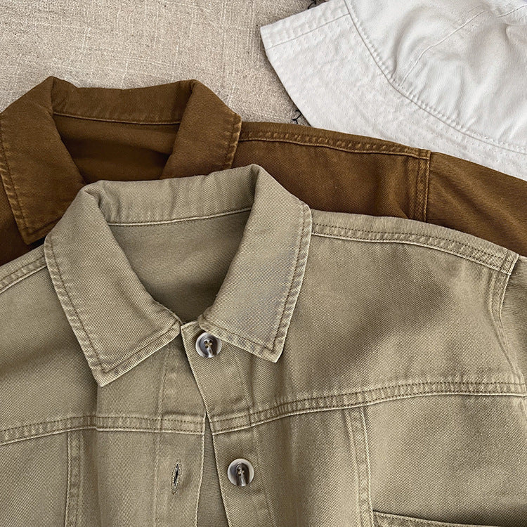 A stylish baby denim jacket in khaki and brown colors, showcasing a cool Japan style design suitable for both boys and girls.