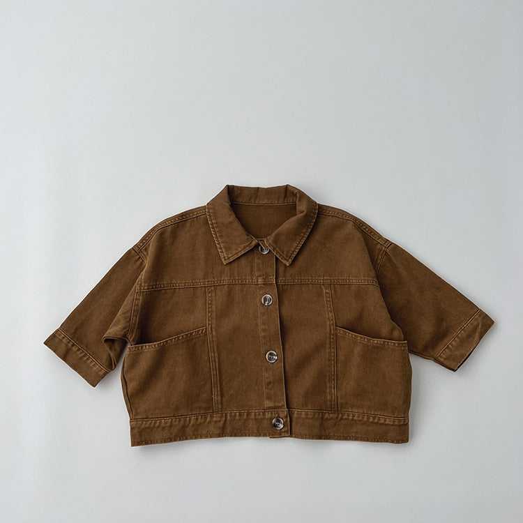 A stylish baby denim jacket in khaki and brown colors, showcasing a cool Japan style design suitable for both boys and girls.
