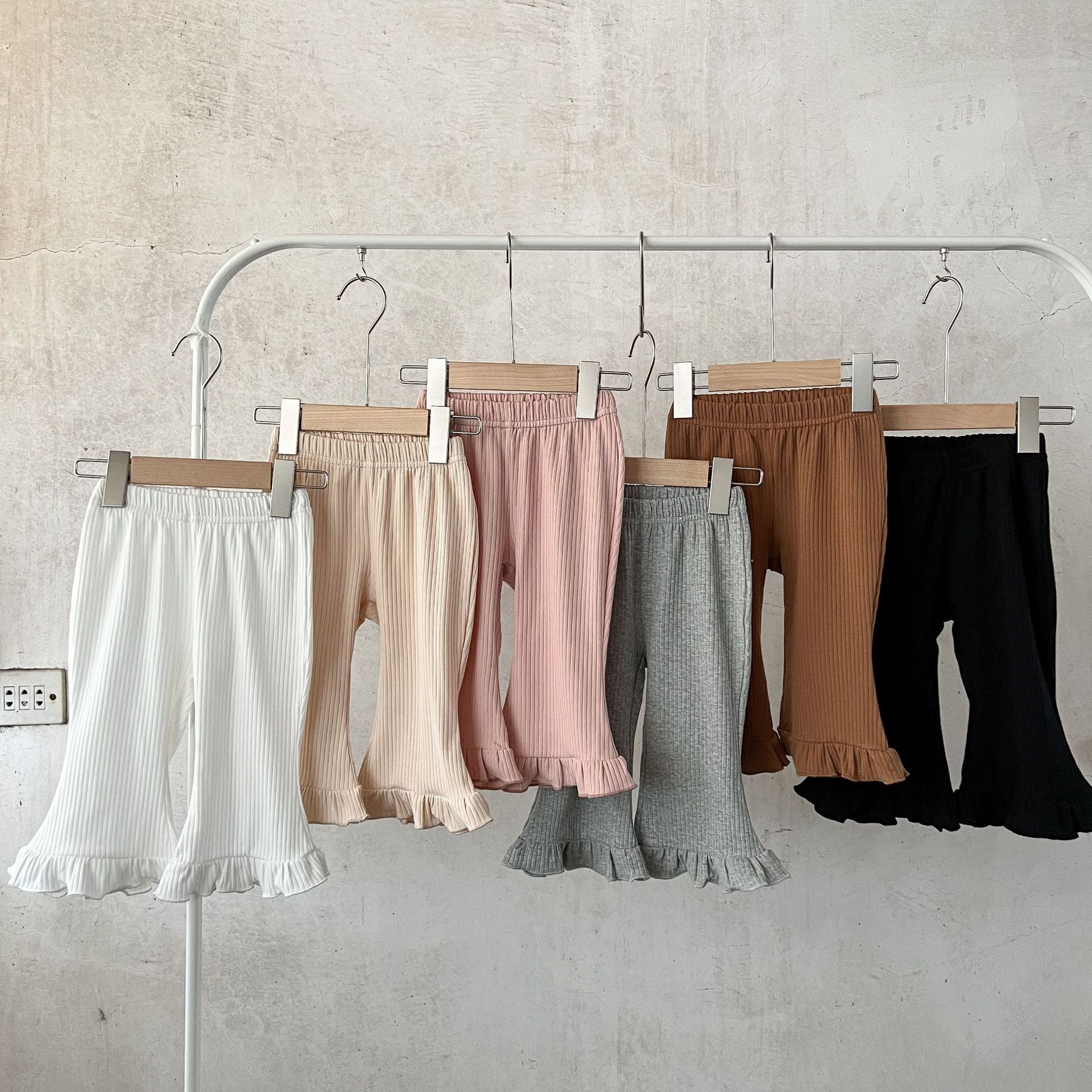 Baby Solid Color Elastic Cotton Comfy Flared Pants in various colors, showcasing the soft fabric and flared design.