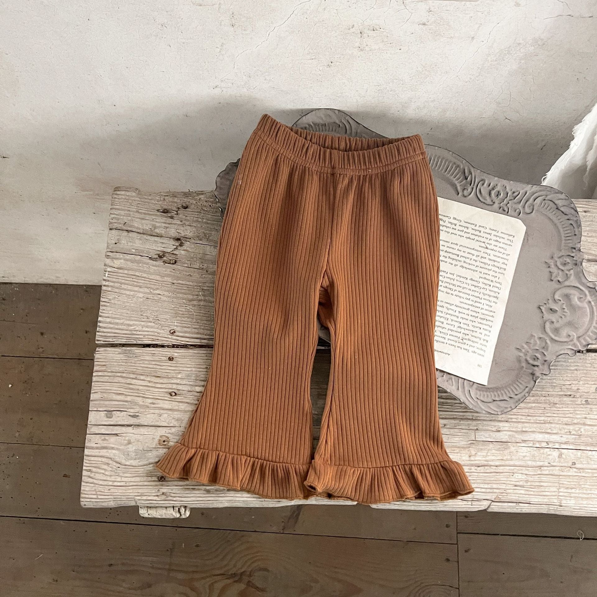 Baby Solid Color Elastic Cotton Comfy Flared Pants in various colors, showcasing the soft fabric and flared design.