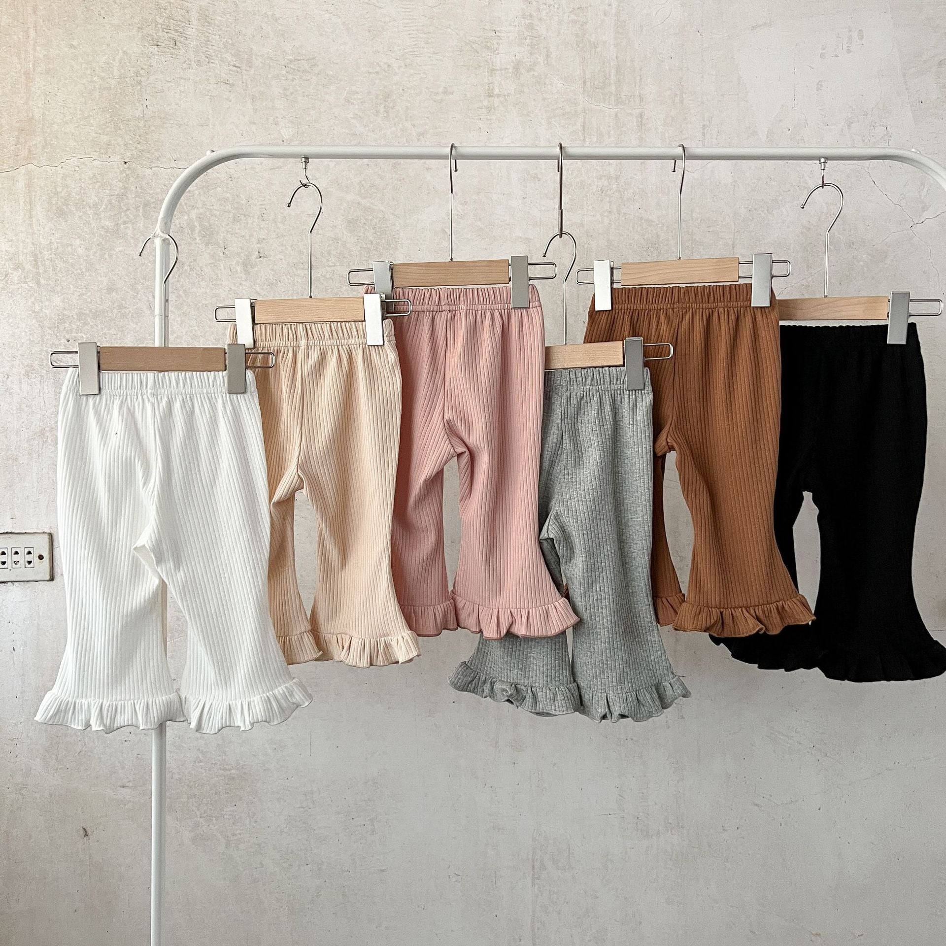 Baby Solid Color Elastic Cotton Comfy Flared Pants in various colors, showcasing the soft fabric and flared design.