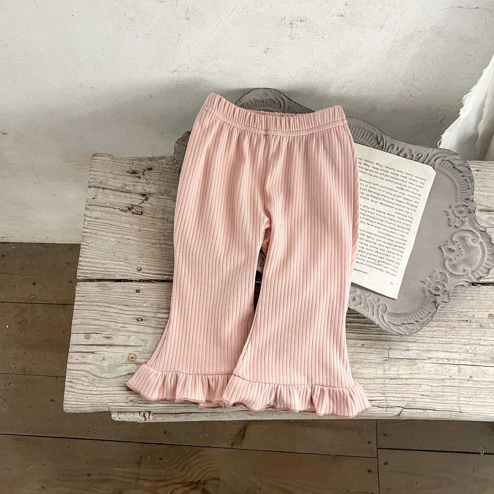 Baby Solid Color Elastic Cotton Comfy Flared Pants in various colors, showcasing the soft fabric and flared design.