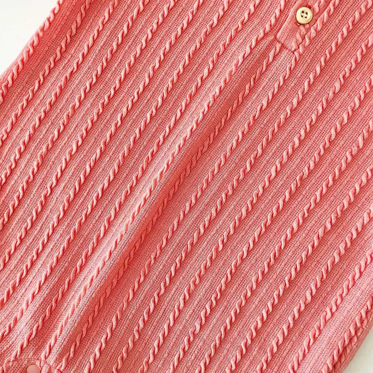 Baby Solid Color Long Sleeve Soft Cotton Romper in pink, apricot, and brown, showcasing its simple style and soft fabric.