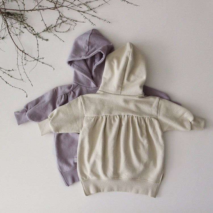 A vibrant purple and apricot baby hoodie with long sleeves, showcasing a stylish Korean design made from soft cotton fabric.