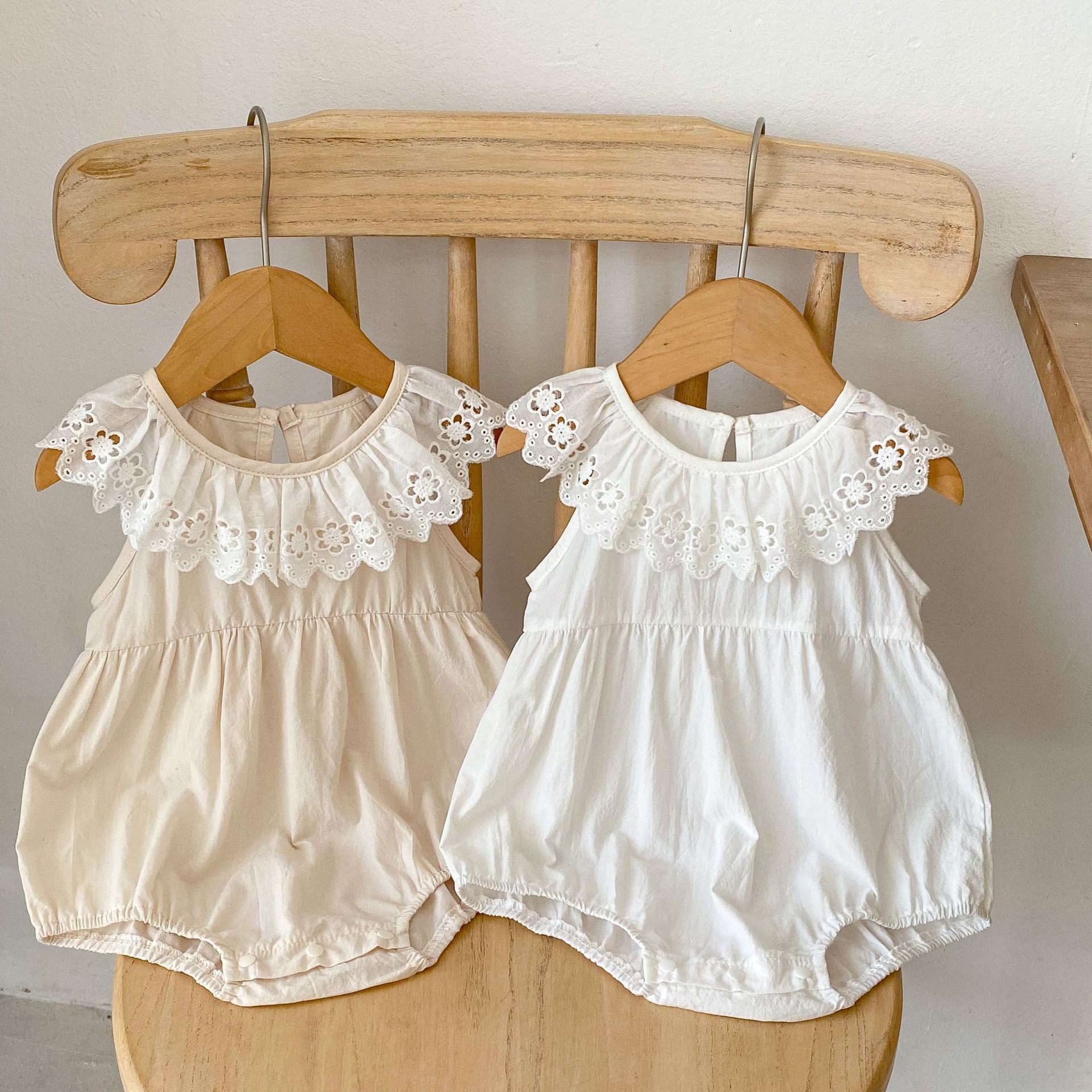 Baby Solid Color Mesh Doll Neck Sleeveless Onesies in white and brown, showcasing soft cotton fabric and stylish doll neck design.