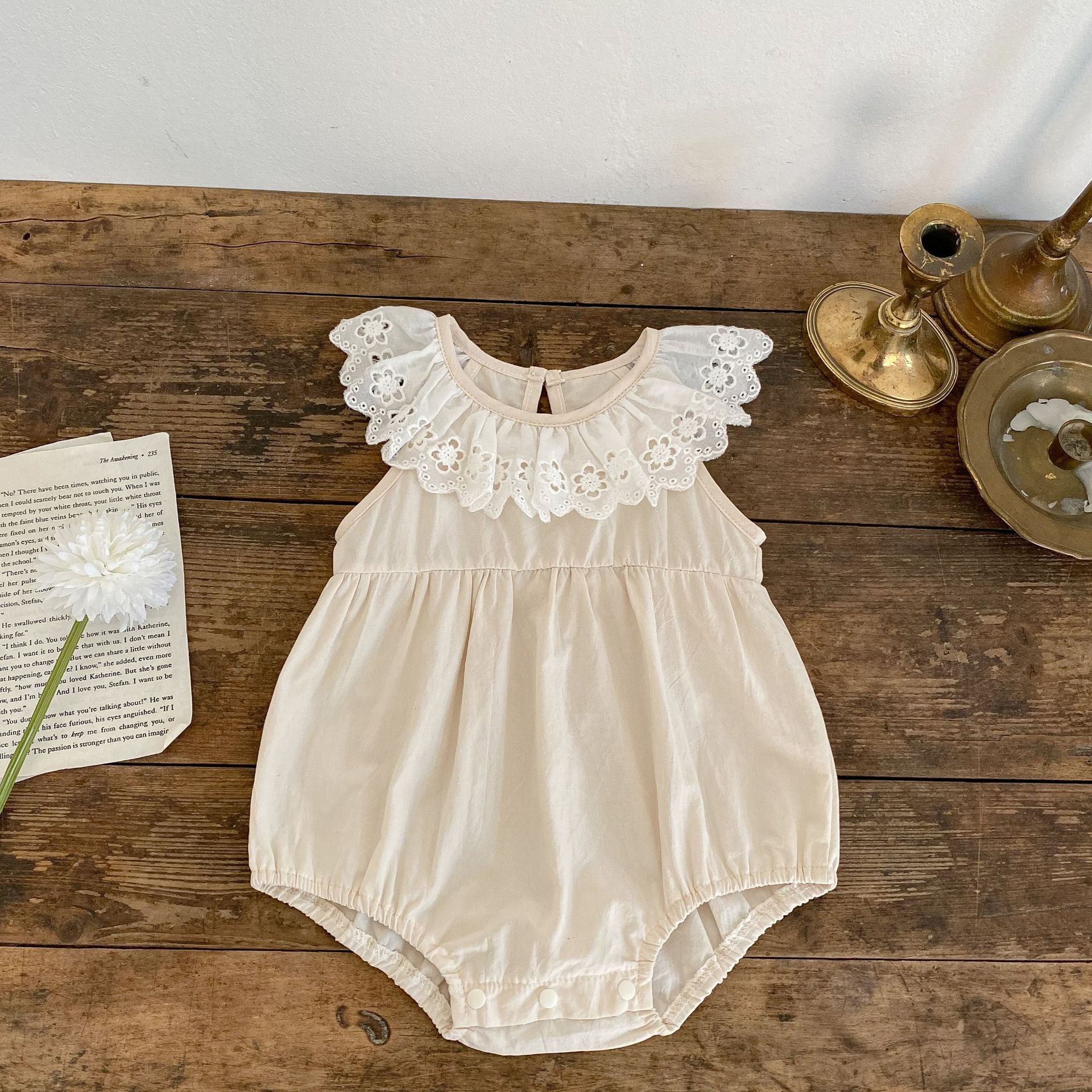 Baby Solid Color Mesh Doll Neck Sleeveless Onesies in white and brown, showcasing soft cotton fabric and stylish doll neck design.