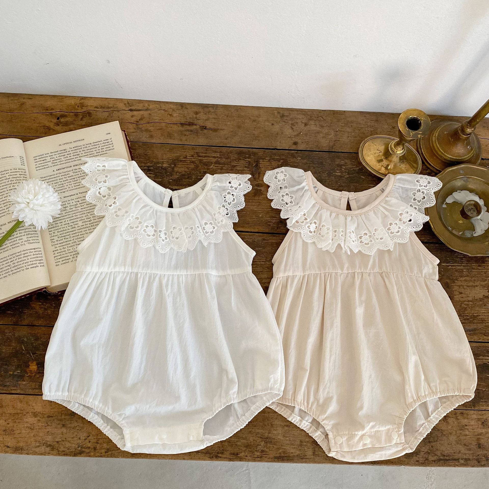 Baby Solid Color Mesh Doll Neck Sleeveless Onesies in white and brown, showcasing soft cotton fabric and stylish doll neck design.