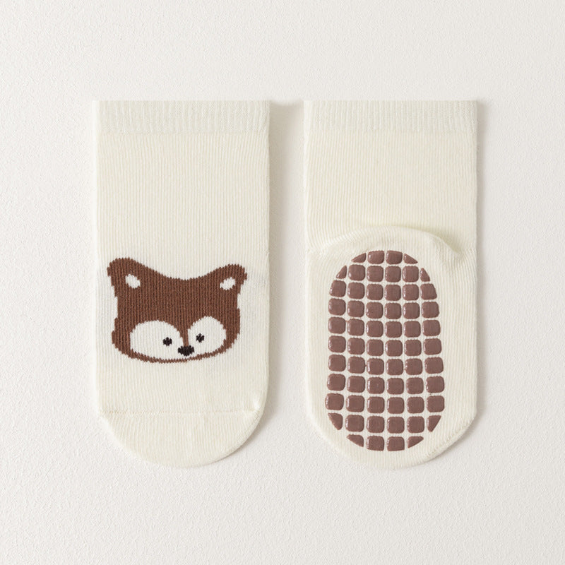 A pair of baby unisex cartoon socks in various colors, featuring a non-slip design and breathable fabric, perfect for infants and toddlers.