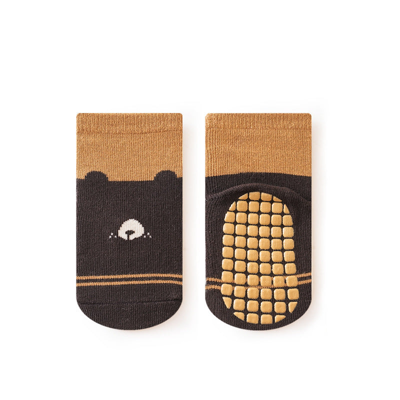 A pair of baby unisex cartoon socks in various colors, featuring a non-slip design and breathable fabric, perfect for infants and toddlers.