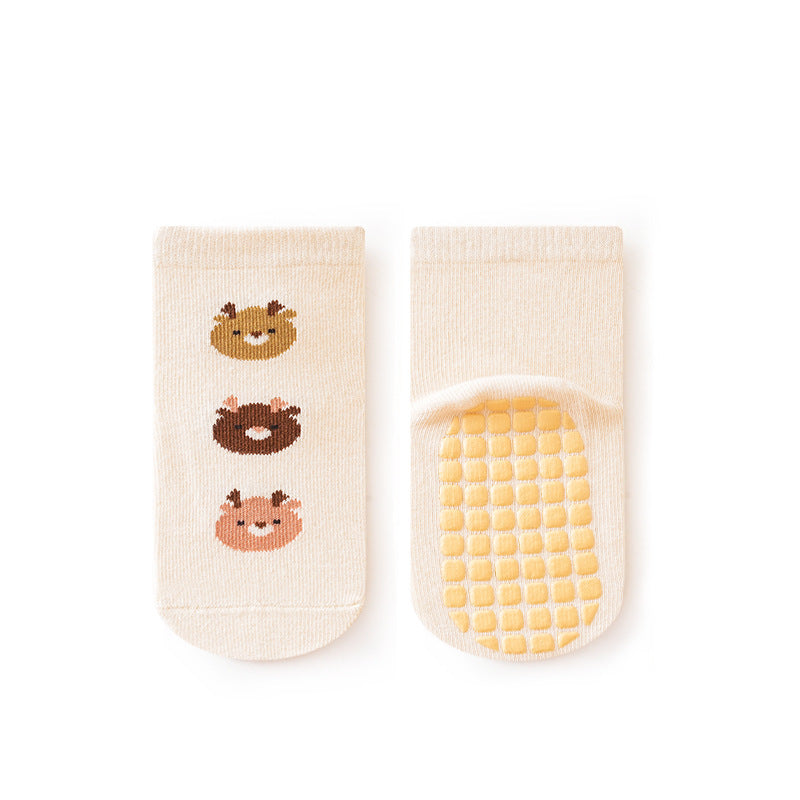 A pair of baby unisex cartoon socks in various colors, featuring a non-slip design and breathable fabric, perfect for infants and toddlers.