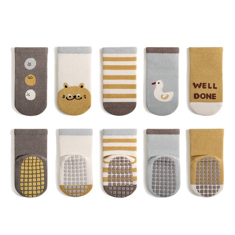 A pair of baby unisex breathable thermal socks featuring cartoon patchwork design in various colors, ideal for toddlers.