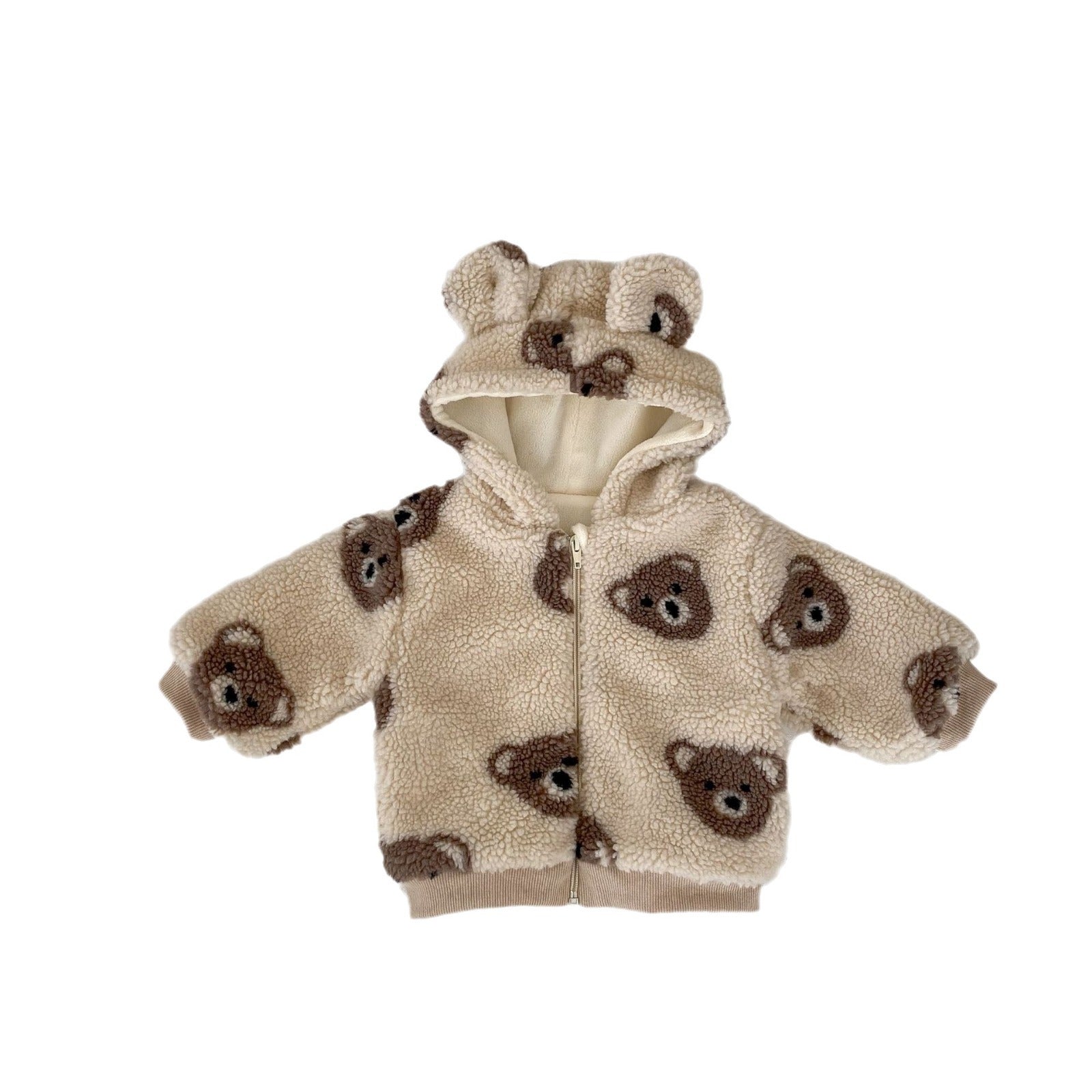 Baby wearing a warm plush coat with a bear head design, perfect for winter.