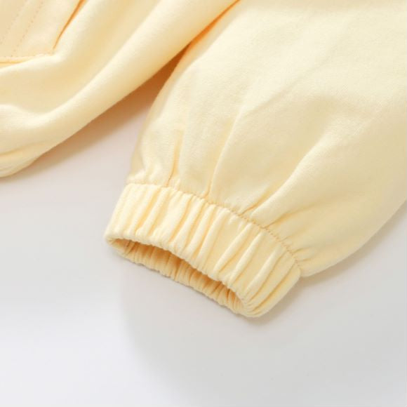 Baby unisex solid color cardigan set in apricot with cartoon shape design, made from soft cotton material.