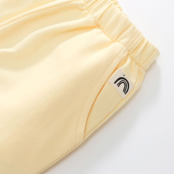 Baby unisex solid color cardigan set in apricot with cartoon shape design, made from soft cotton material.