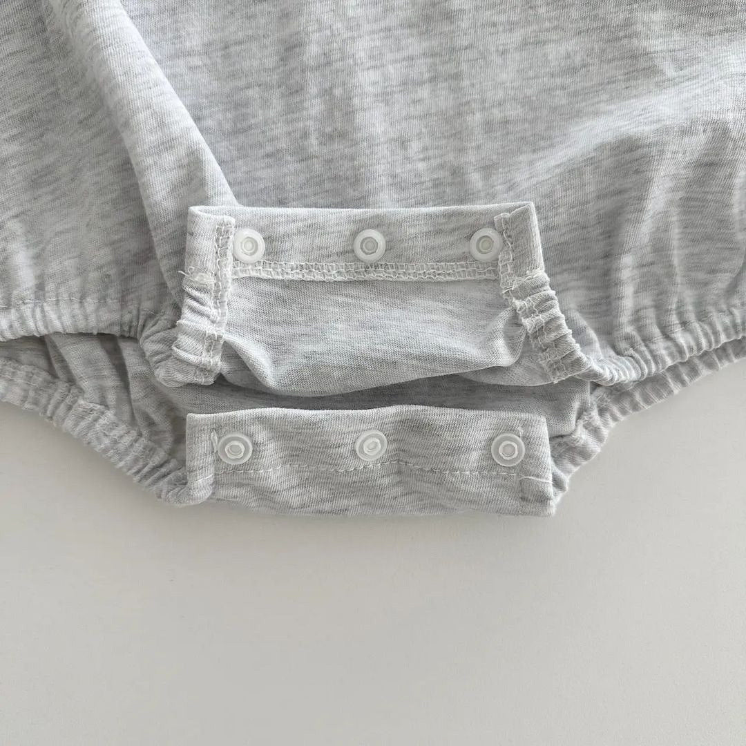 Baby unisex solid color print pattern casual onesies in white and grey, made from soft cotton, perfect for summer wear.