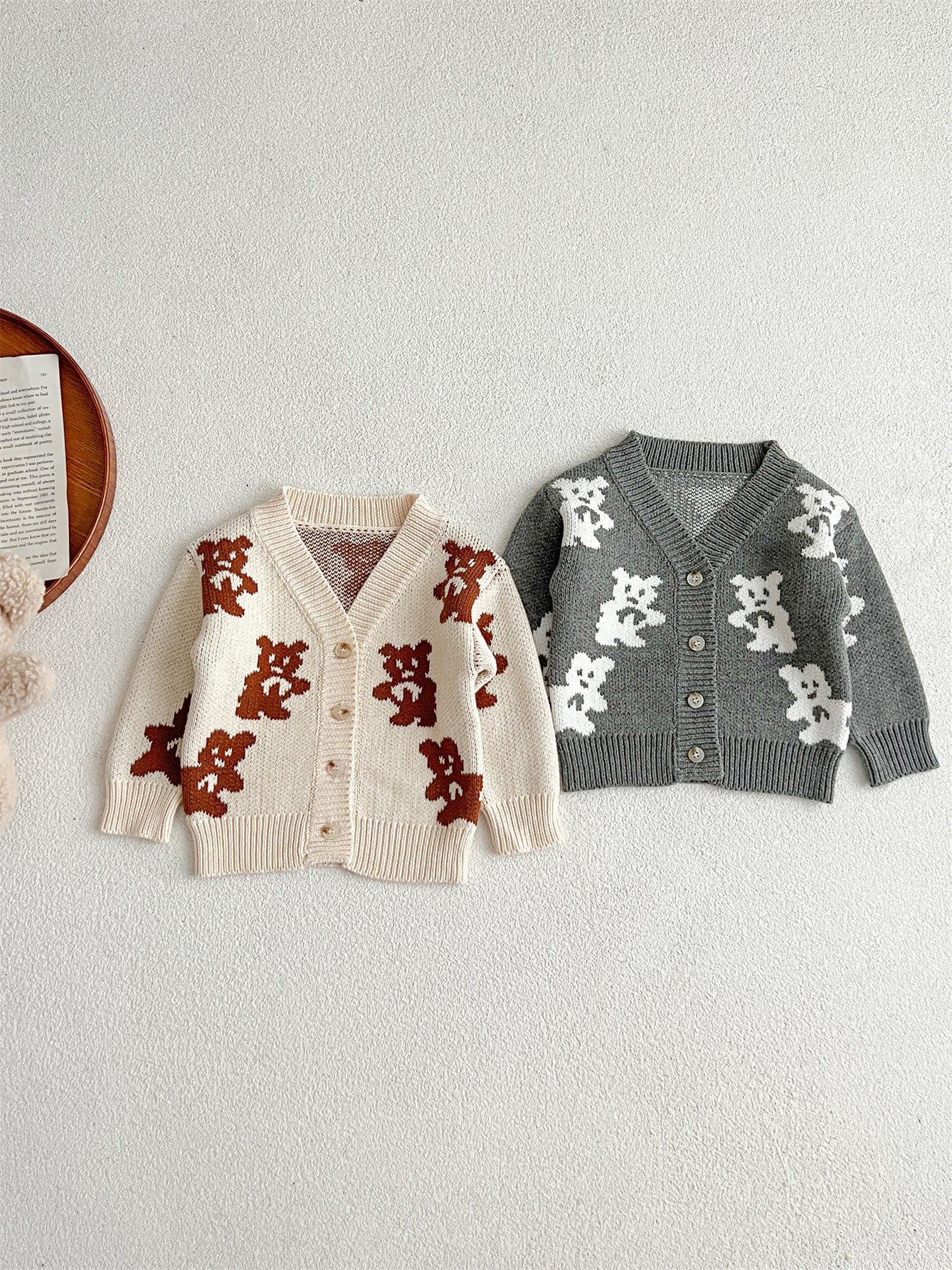 Baby unisex long-sleeved cardigan featuring a cute bear pattern in grey and beige colors, perfect for infants and toddlers.