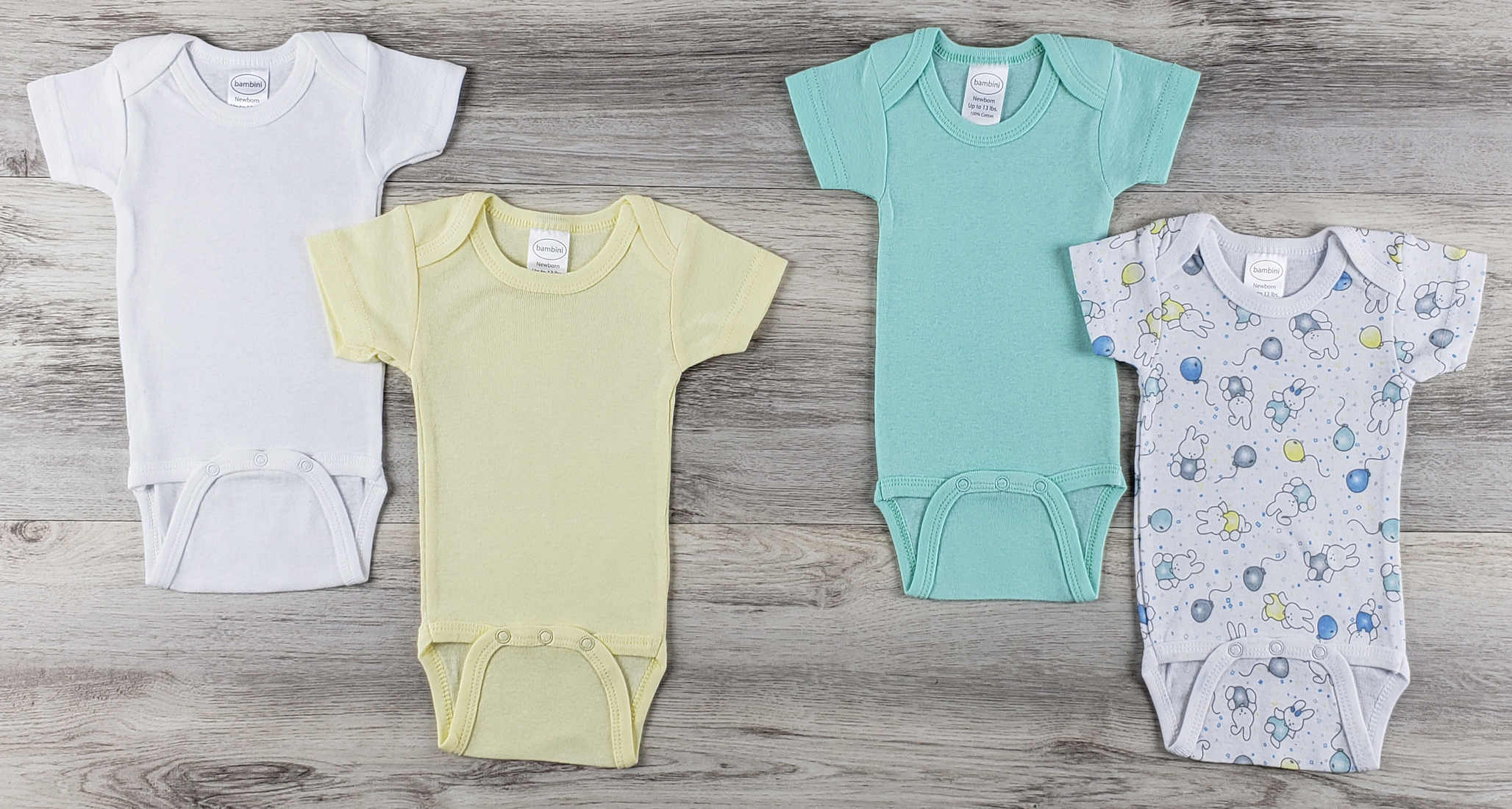 Bambini 4 Pc Layette Baby Clothes Set featuring soft cotton short sleeve onesies in various colors and prints.