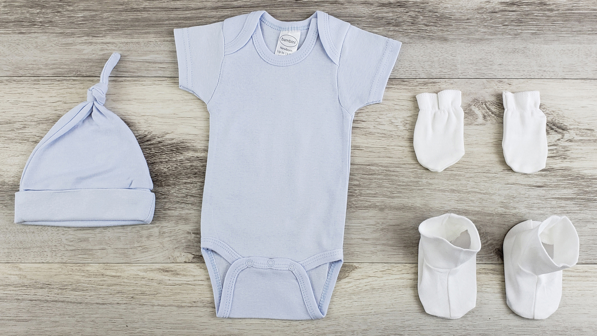 Bambini 5 Pc Layette Baby Clothes Set featuring a blue onesie, knotted cap, mittens, and booties, all made from soft cotton for newborn comfort.