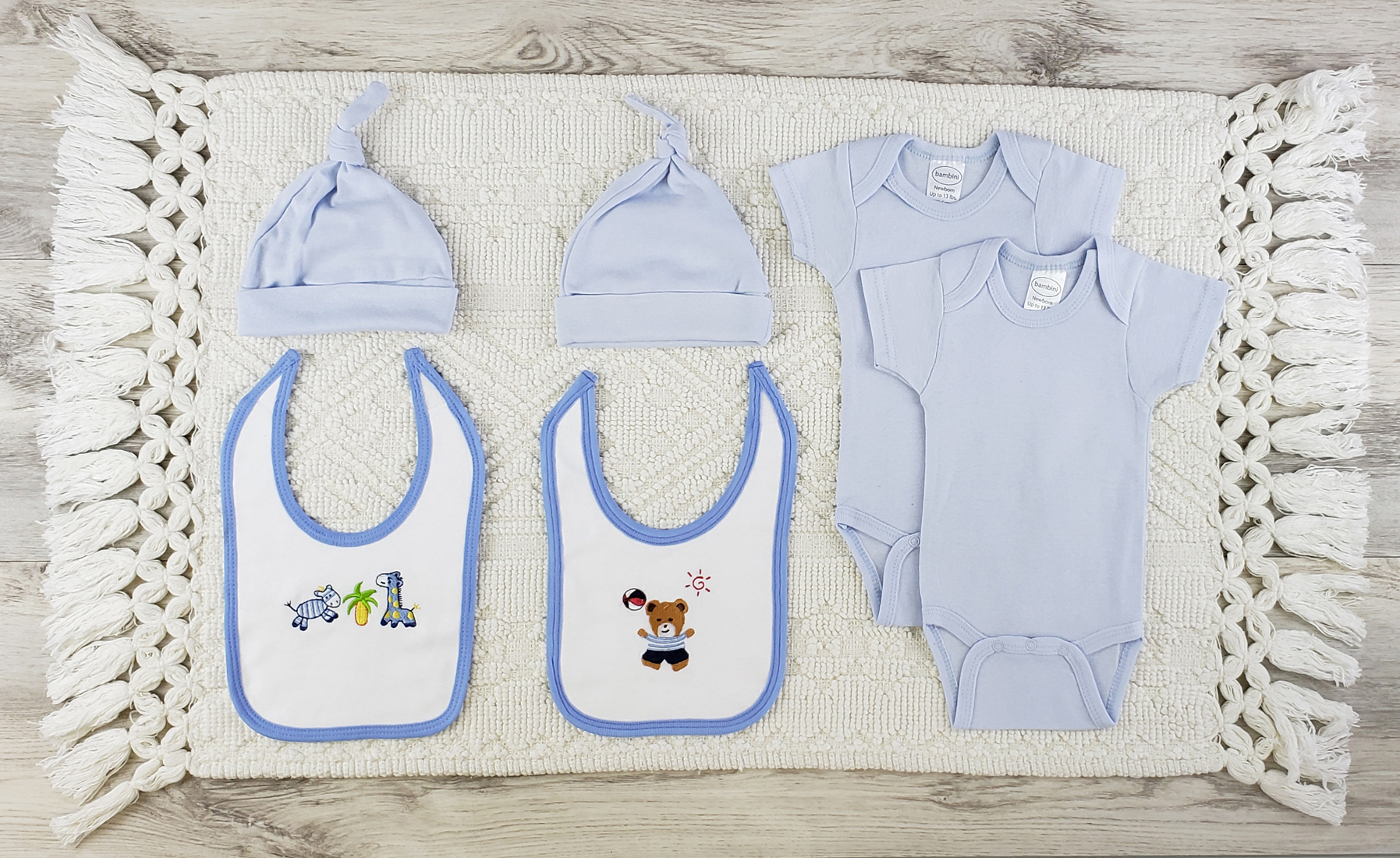 Bambini 6 Pc Layette Baby Clothes Set featuring soft cotton onesies, bibs, and knotted caps in blue and white, perfect for newborns.