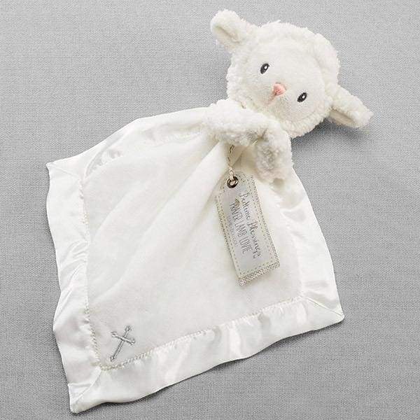 A soft cream plush lamb lovie with a rattle, featuring hands in prayer and a silvery thread cross applique, perfect for babies.