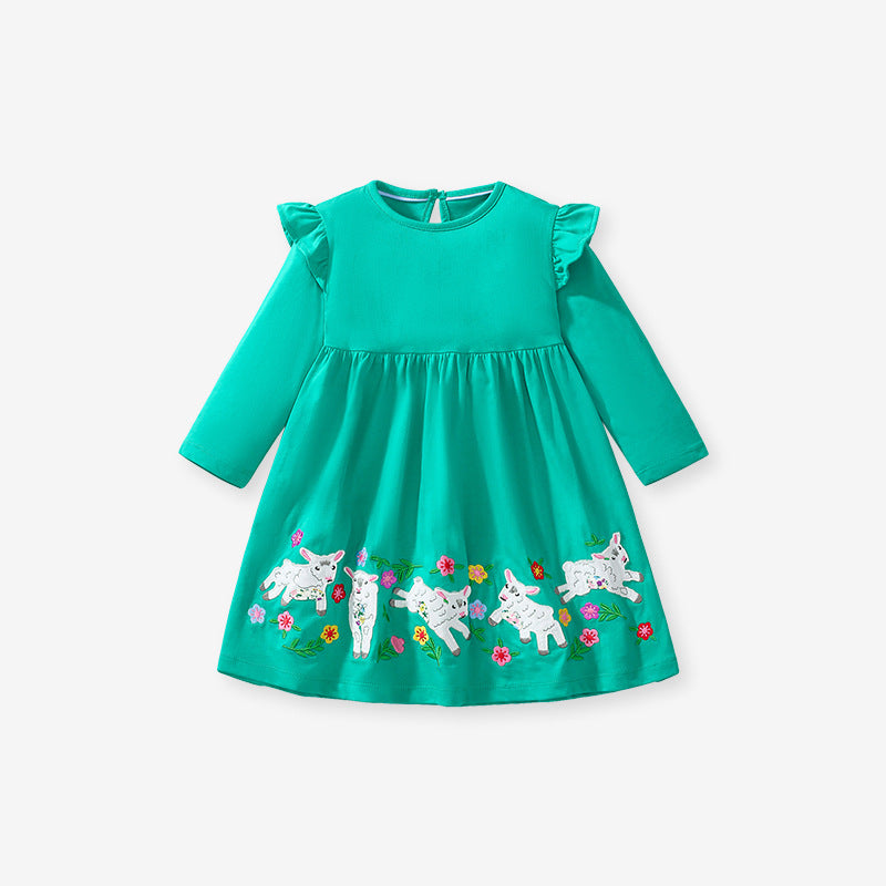 A vibrant green long-sleeved top for girls featuring cartoon flowers and a lamb design, made from soft cotton material.