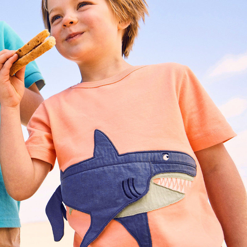 Big Shark Pattern Boys’ T-Shirt in vibrant orange color, made of soft cotton, featuring a playful shark cartoon design.