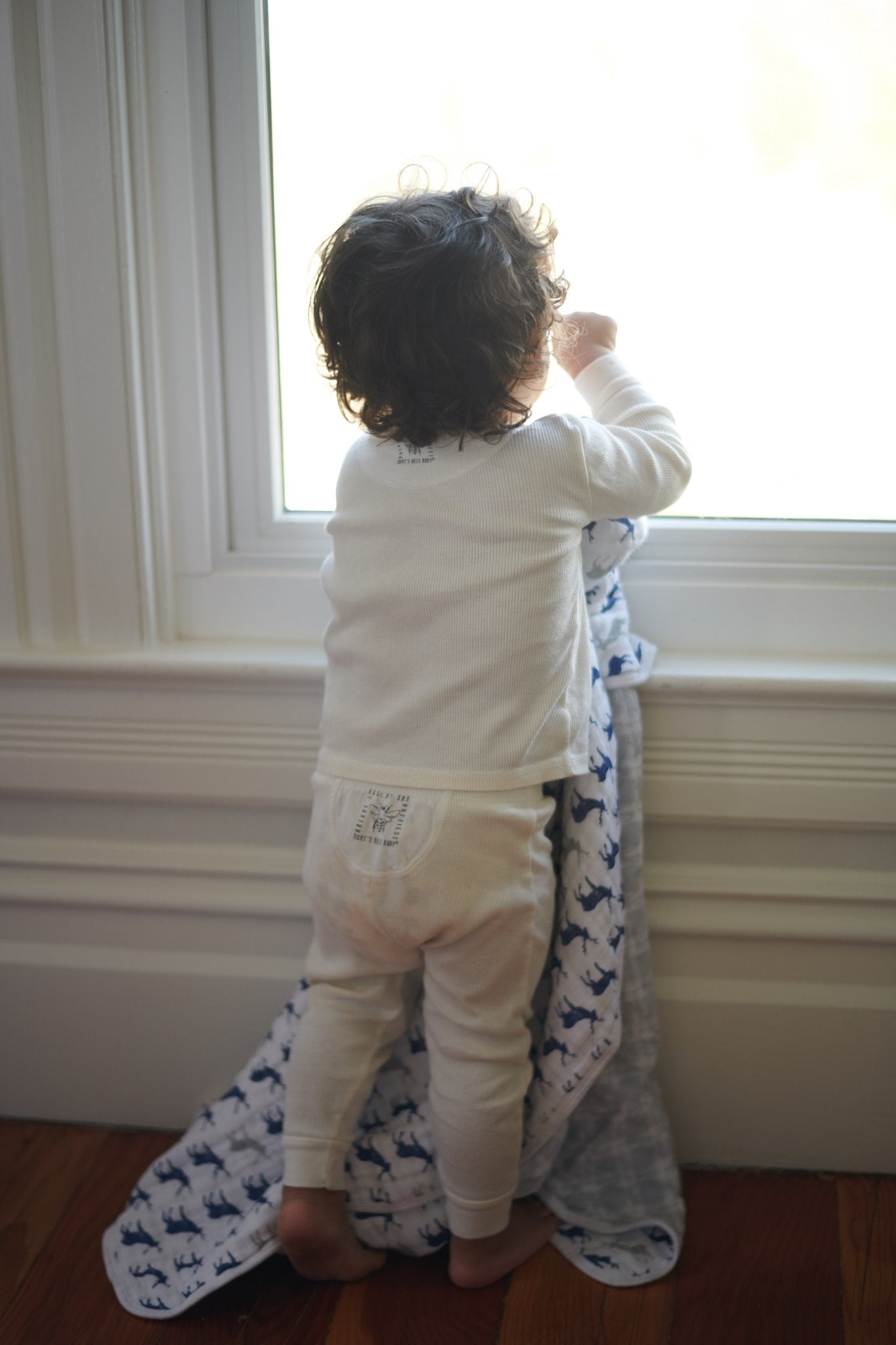 Blue Deer and Glacier Grey Plaid Cotton Muslin Newcastle Blanket, soft and cozy, perfect for kids.