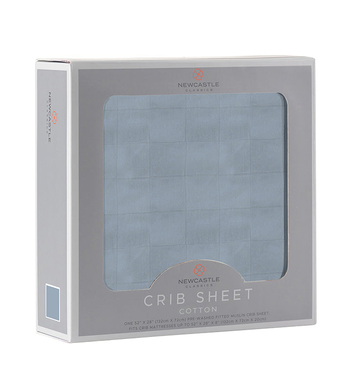 Blue Fog Newcastle Cotton Crib Sheet made from soft breathable cotton muslin, designed for standard crib mattresses.