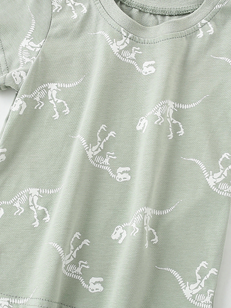 Boys' green short sleeves t-shirt featuring a playful bony dinosaur cartoon pattern, perfect for summer wear.